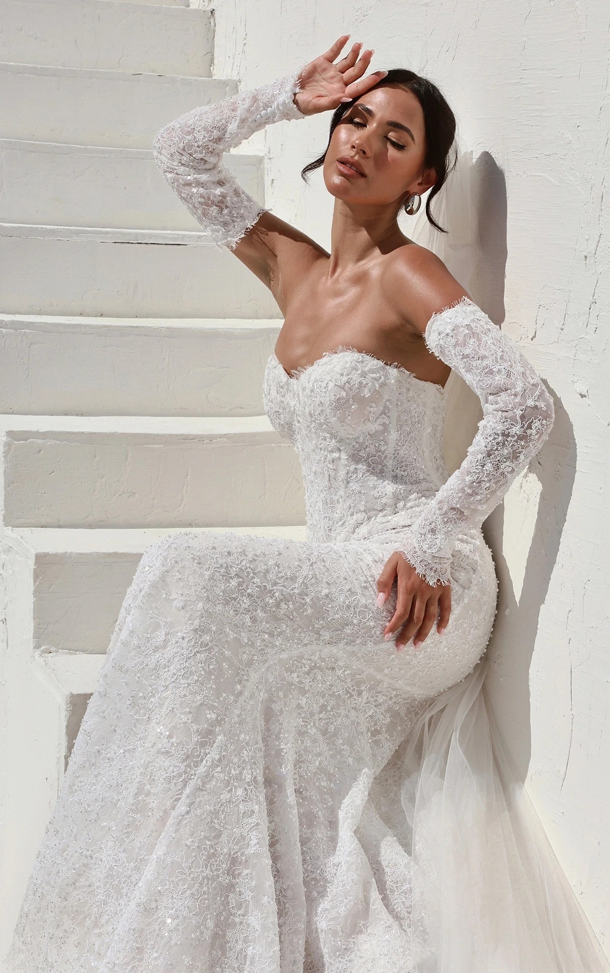 Model in white Martina Liana Wedding dress