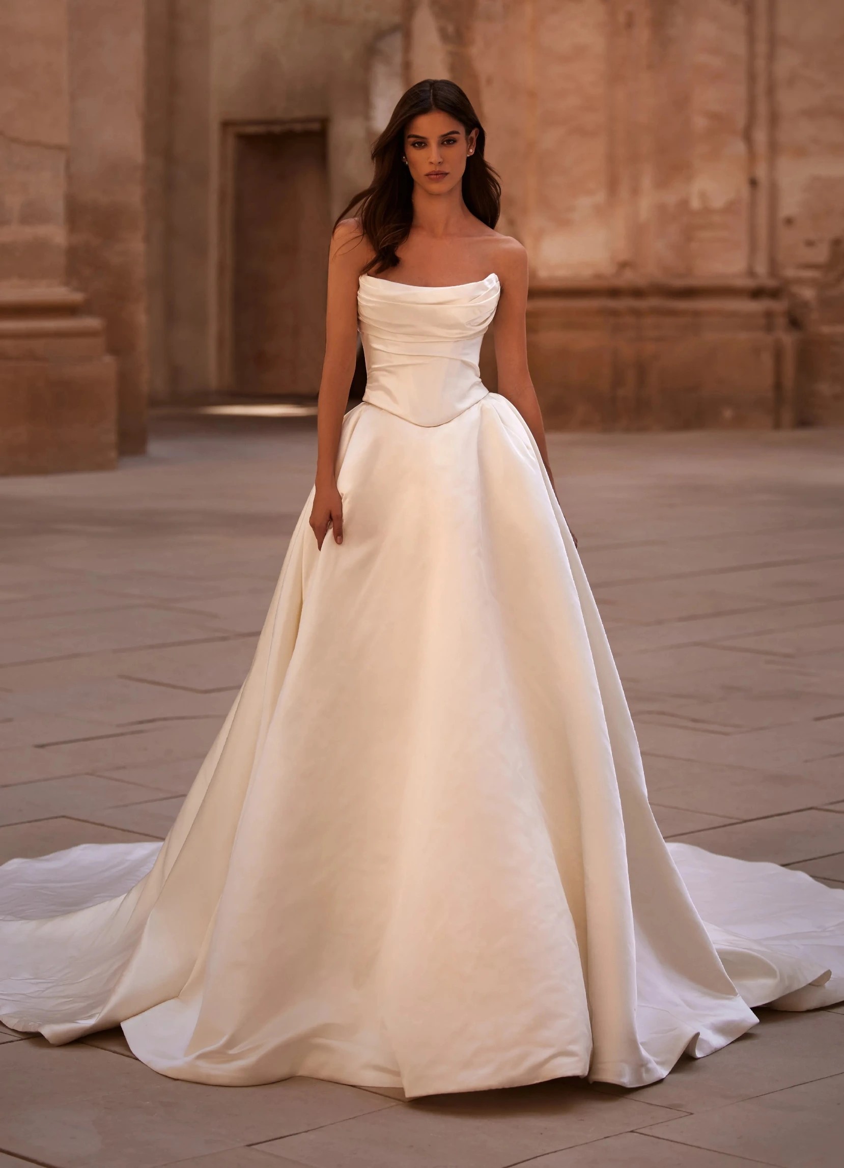 Model in white Milla Nova wedding dress