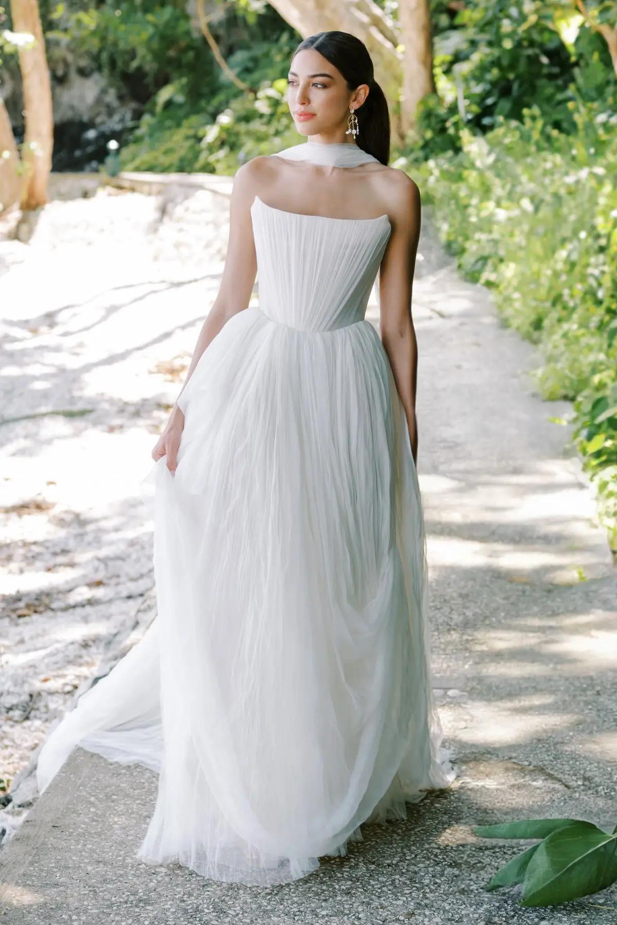 Model in white Watters wedding dress