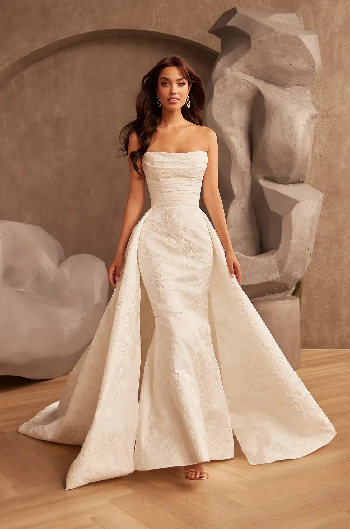 Model wearing Paloma Blanca wedding gown