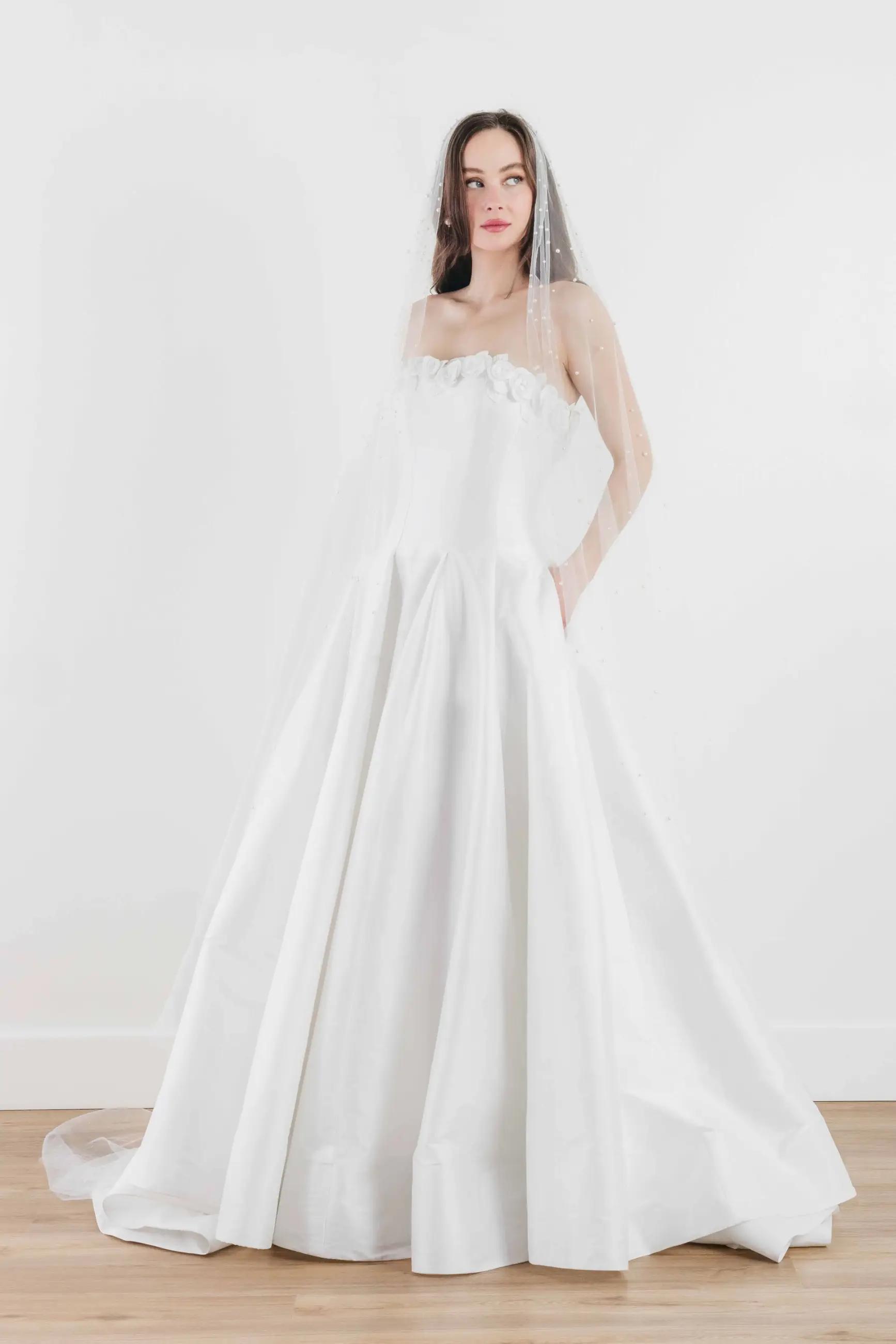 Model wearing Wtoo wedding gown