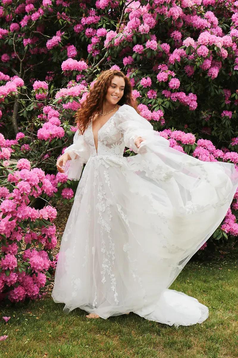 Model wearing All Who Wander wedding gown