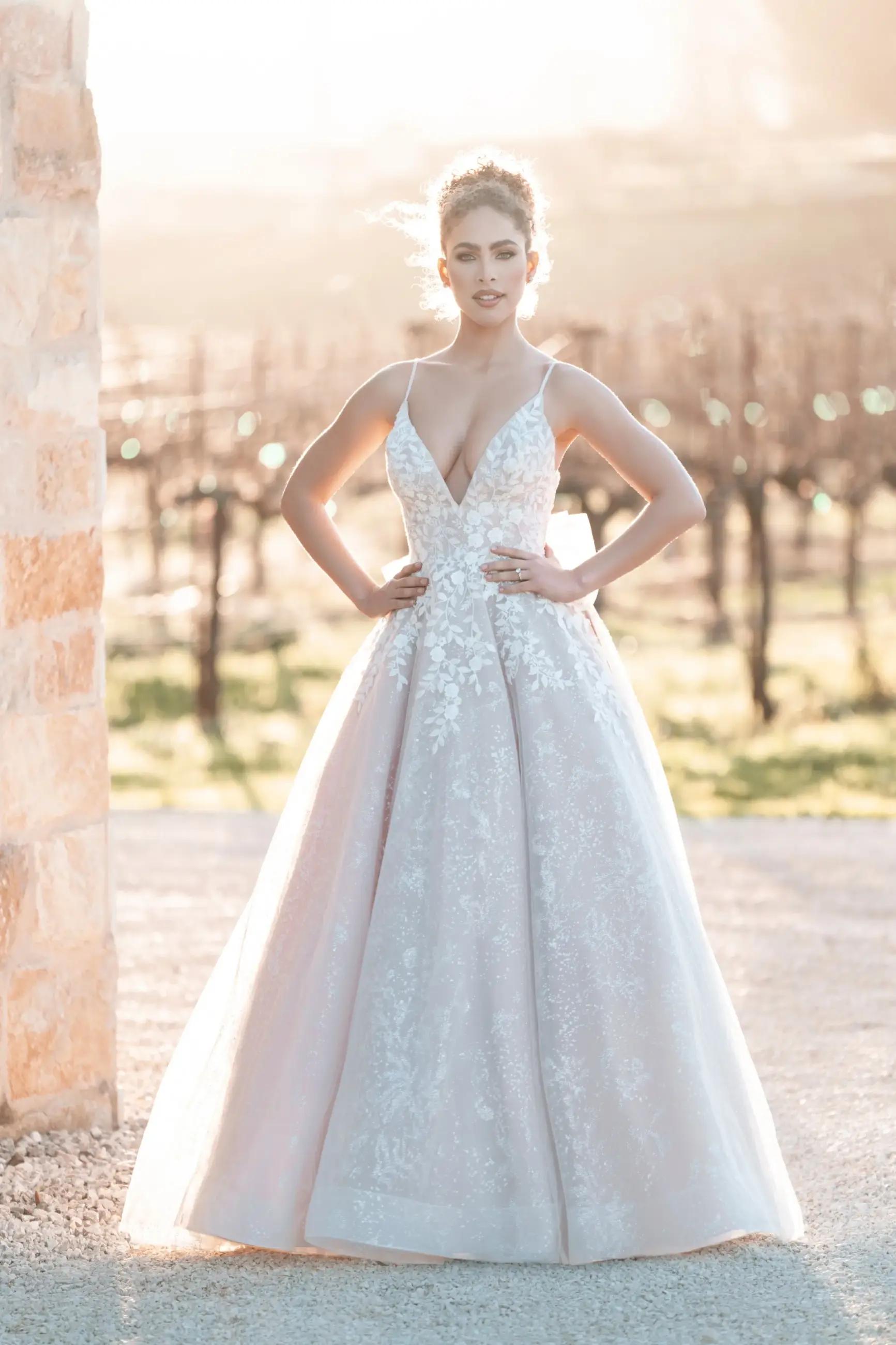 Model wearing Allure Bridals wedding gown